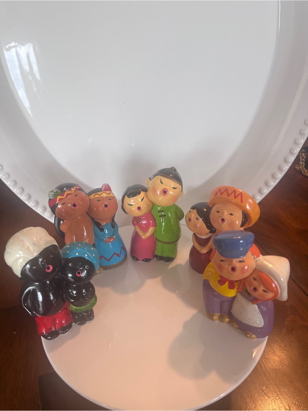 It’s a small world chalkware set of 5 cultural singing figurines